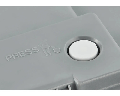 Tlačidlo so symbolom a nápisom ''Pressen''.