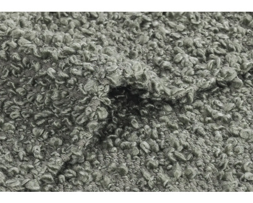 Detailný záber koberca so slučkovou štruktúrou