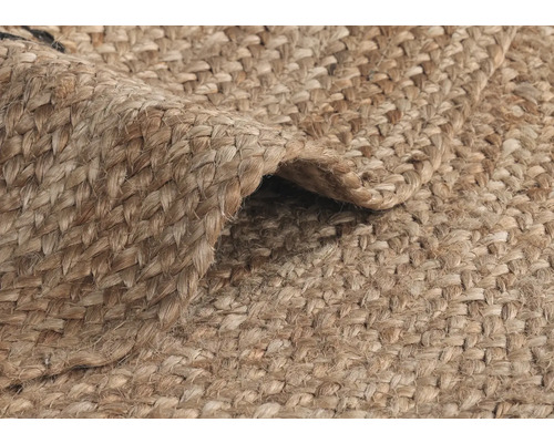 Detail tkaného koberca z prírodných vlákien