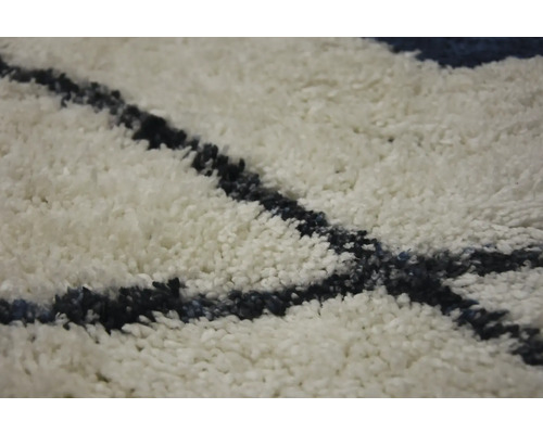 Detailný pohľad na koberec so vzorom