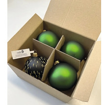 Kartón so štyrmi vianočnými ozdobami, vrátane čiernej gule so zlatými akcentmi a troch zelených gúľ