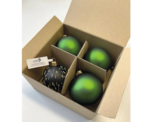 Kartón so štyrmi vianočnými ozdobami, vrátane čiernej gule so zlatými akcentmi a troch zelených gúľ