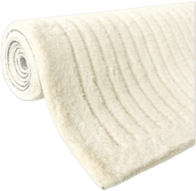 Zrolovaný koberec s pruhovaným vzorom