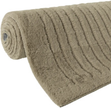Zrolovaný koberec s rebrovanou textúrou