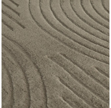 Detail koberca s vlnitým vzorom