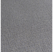 Detailný záber na sivú štruktúrovanú tapetu