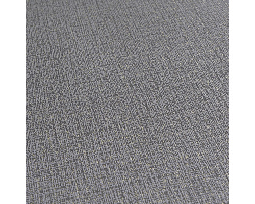 Detailný záber na sivú štruktúrovanú tapetu