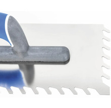 Detailný záber zubovej stierky s rukoväťou