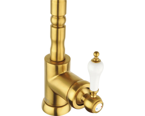 Zlatá umývadlová batéria s bielou rukoväťou