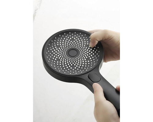 Ručná sprcha s rôznymi druhmi prúdu sa nastavuje