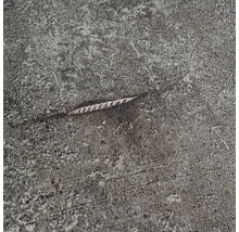 Detail šedého povrchu so škrabancom