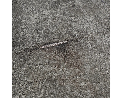 Detail šedého povrchu so škrabancom