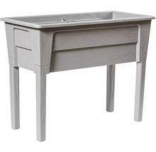 Drevený vyvýšený záhon s integrovaným kvetináčom a úložným priestorom