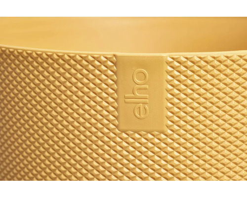 Detailný pohľad na kvetináč s logom Elho a trojrozmerným povrchom