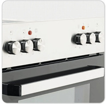 Detail sporáka s otočnými gombíkmi