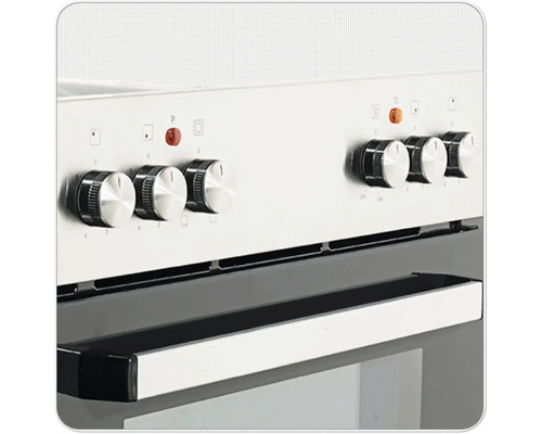 Detail sporáka s otočnými gombíkmi