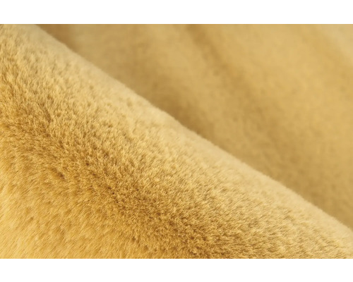 Detail látky imitujúcej kožušinu