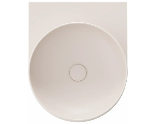 Pohľad zhora na okrúhle umývadlo na doske s obdĺžnikovým pôdorysom