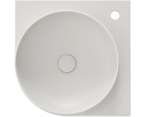 Pohľad zhora na umývadlo na dosku zo sanitárnej keramiky s okrúhlou misou a štvorcovým základným tvarom