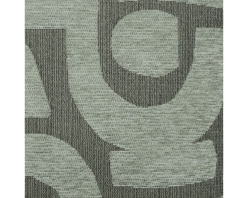 Detailný pohľad na koberec s písmenovým vzorom