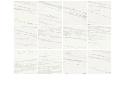 Viaceré biele dlaždice s mramorovým vzhľadom.