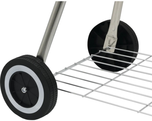 Detailný pohľad na kolieska a odkladací rošt grilovacieho vozíka.