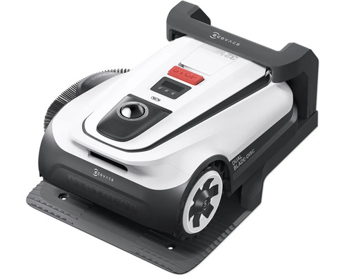 Robotická kosačka na trávu na nabíjacej stanici