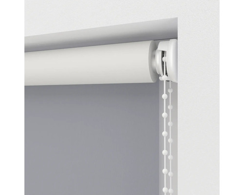 Roleta s retiazkovým ovládaním na dekoráciu okien a ochranu proti slnku