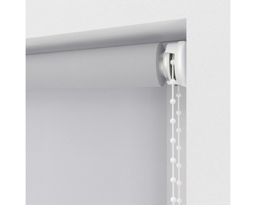Systém rolety s ovládacou retiazkou na dekoráciu okien