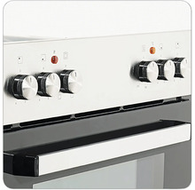 Detailný pohľad na elektrický sporák s otočnými gombíkmi na reguláciu teploty