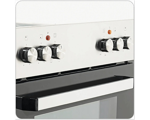 Detailný záber sporáka s otočnými gombíkmi na reguláciu teploty