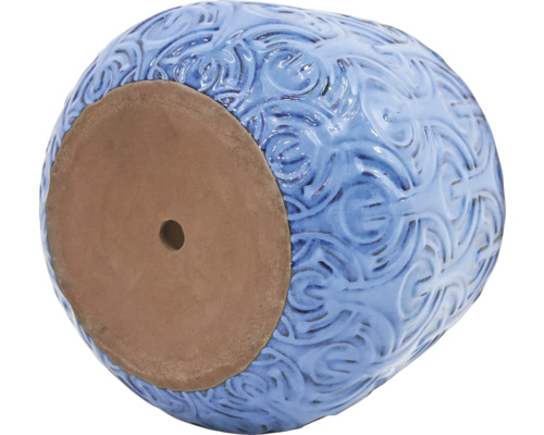 Modrý kvetináč s otvorom v dne