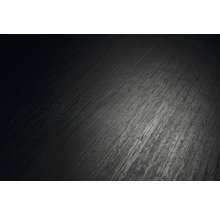 Tmavý štruktúrovaný povrch vo vzhľade dreva, detailný záber laminátovej lamely alebo podlahovej krytiny.