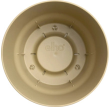 Vnútorný pohľad na okrúhly plastový kvetináč s drenážnymi otvormi a elho Logo.