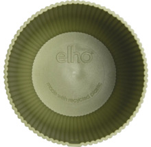 Pohľad zhora do okrúhleho kvetináča elho z recyklovaného plastu s vrúbkovaným vnútrom a elho Logo.