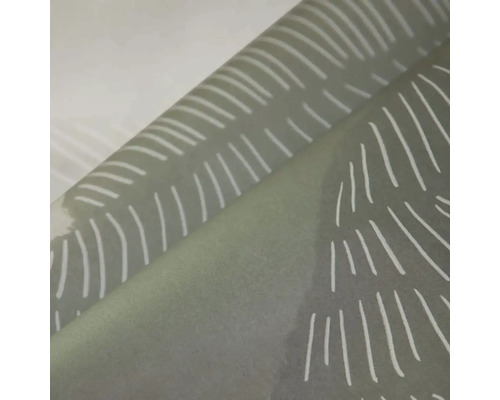Detail tapety s abstraktným líniovým vzorom v tvare listu.