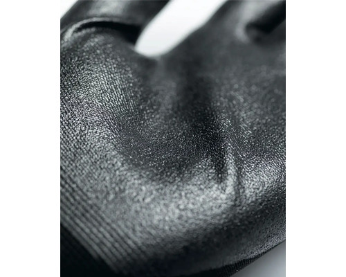 Detailný záber na štruktúrovaný povrch pracovnej rukavice pre lepší úchop.