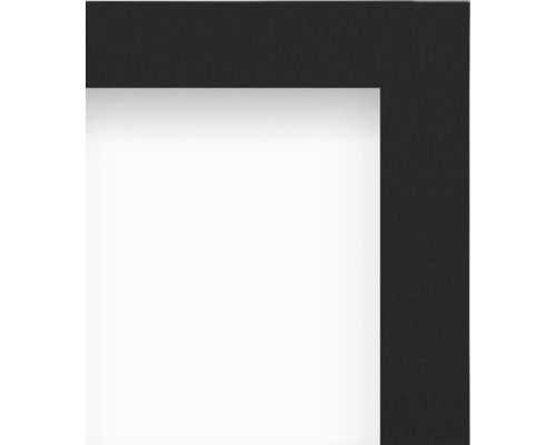 Detailný pohľad na roh čierneho fotorámika s bielou paspartou.