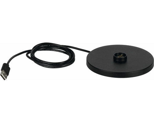 Čierna okrúhla nabíjacia stanica s integrovaným káblom a USB konektorom.