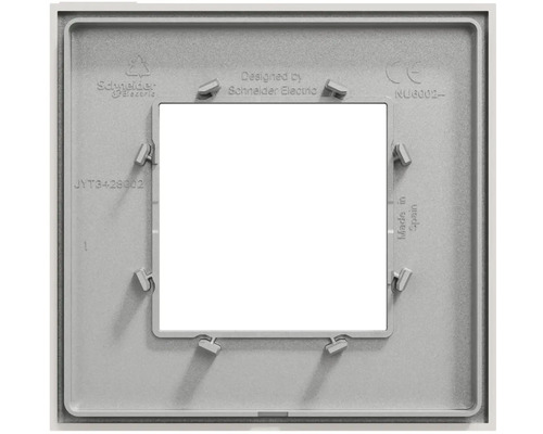 Zadný pohľad na krycí rámik Schneider Electric 1-násobný s upevňovacími svorkami a Schneider Electric Logo.