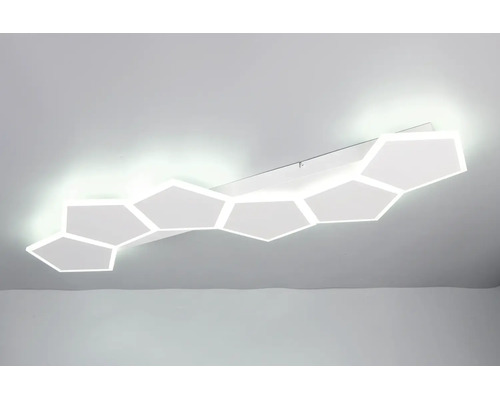 Moderné LED stropné svietidlo s geometrickými prvkami v tvare včelieho plástu namontované na strope