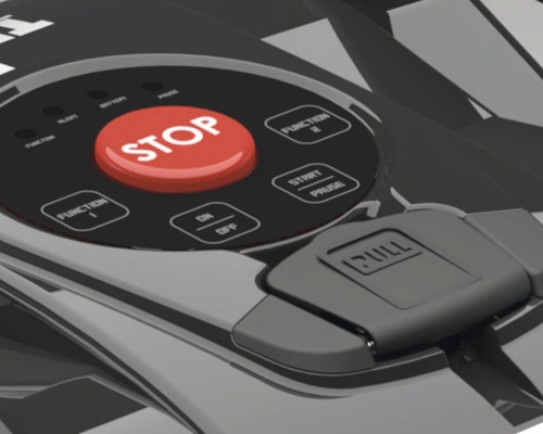 Detail ovládacích prvkov robotickej kosačky s tlačidlom zastavenia, funkčnými tlačidlami a tlačidlom štart-pauza.