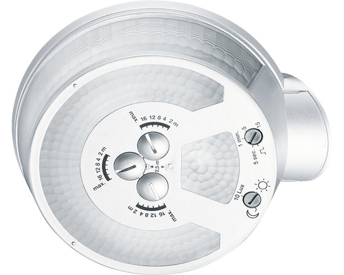 Detailný pohľad na pohybový senzor s nastavovacími gombíkmi pre dosah, čas a jas