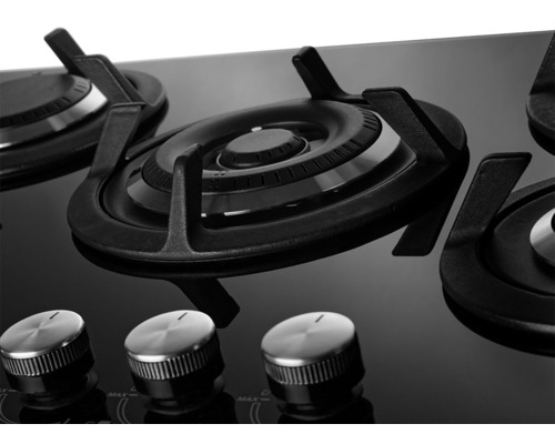 Detail plynovej varnej dosky s otočnými gombíkmi