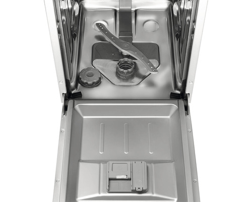 Vnútro umývačky riadu s ostrekovacím ramenom a priehradkou na čistiaci prostriedok