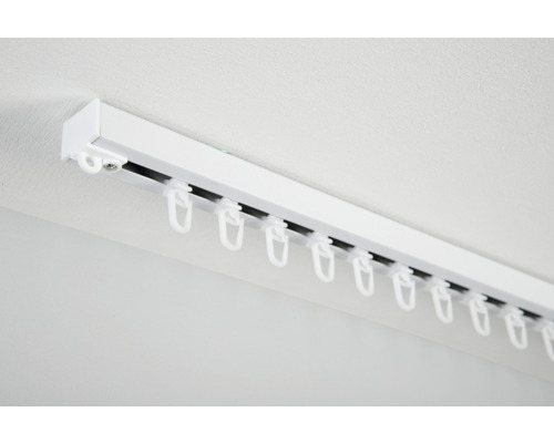 Záclonová koľajnica s klzákmi na montáž na strop