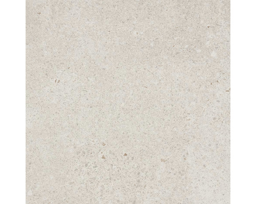 Detail svetlej podlahovej dlaždice s bodkovanou textúrou