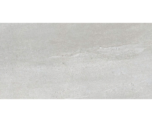 Sivá podlahová dlaždica so vzhľadom kameňa.