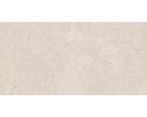 Detail svetlej dlaždice z prírodného kameňa