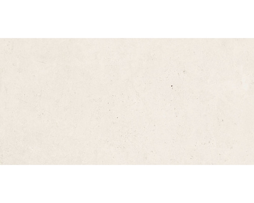 Detail svetlej betónovej steny ako pozadie.